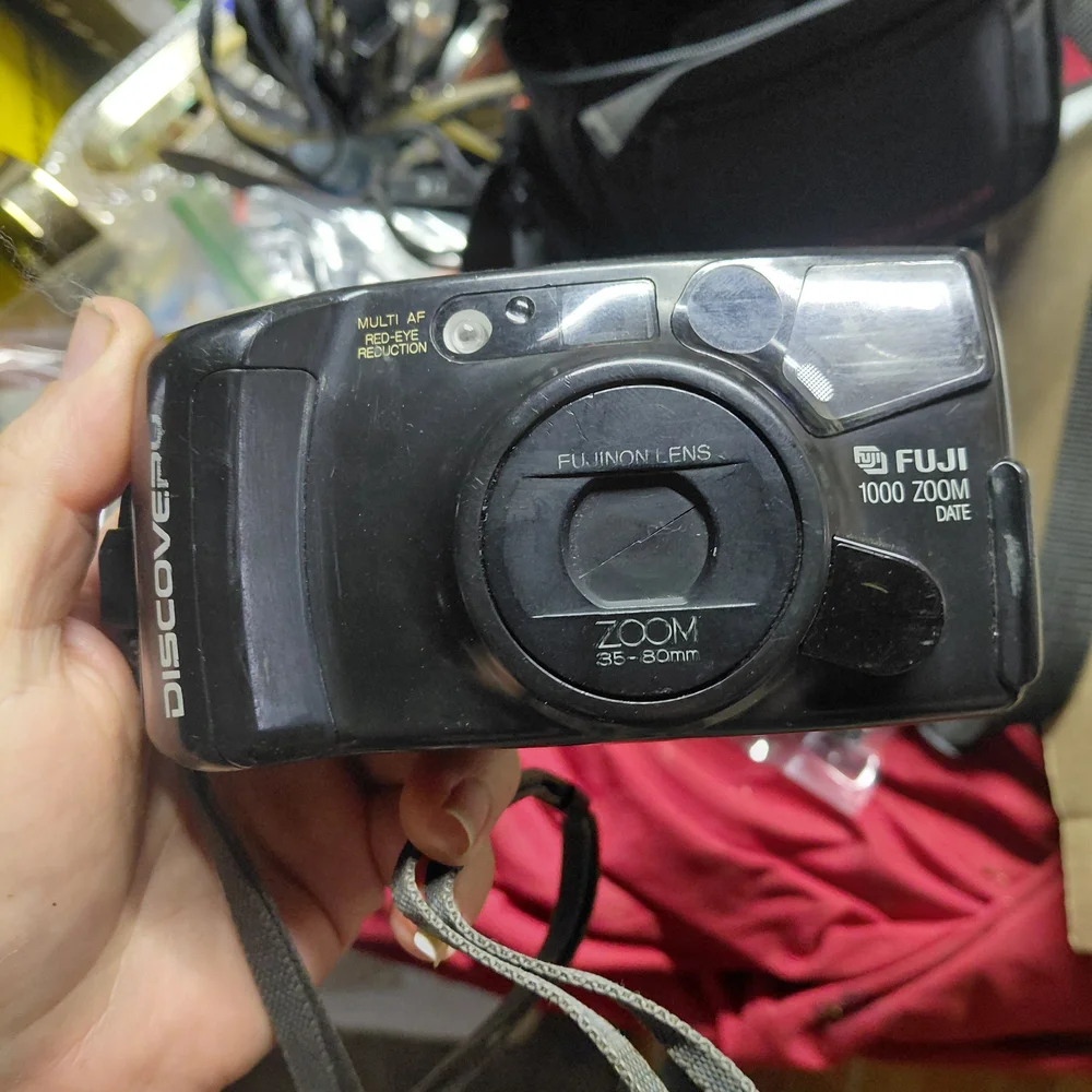 Fuji Discovery 1000 Zoom Date 35mm film camera. With Bag, Film, Film CleaninTool